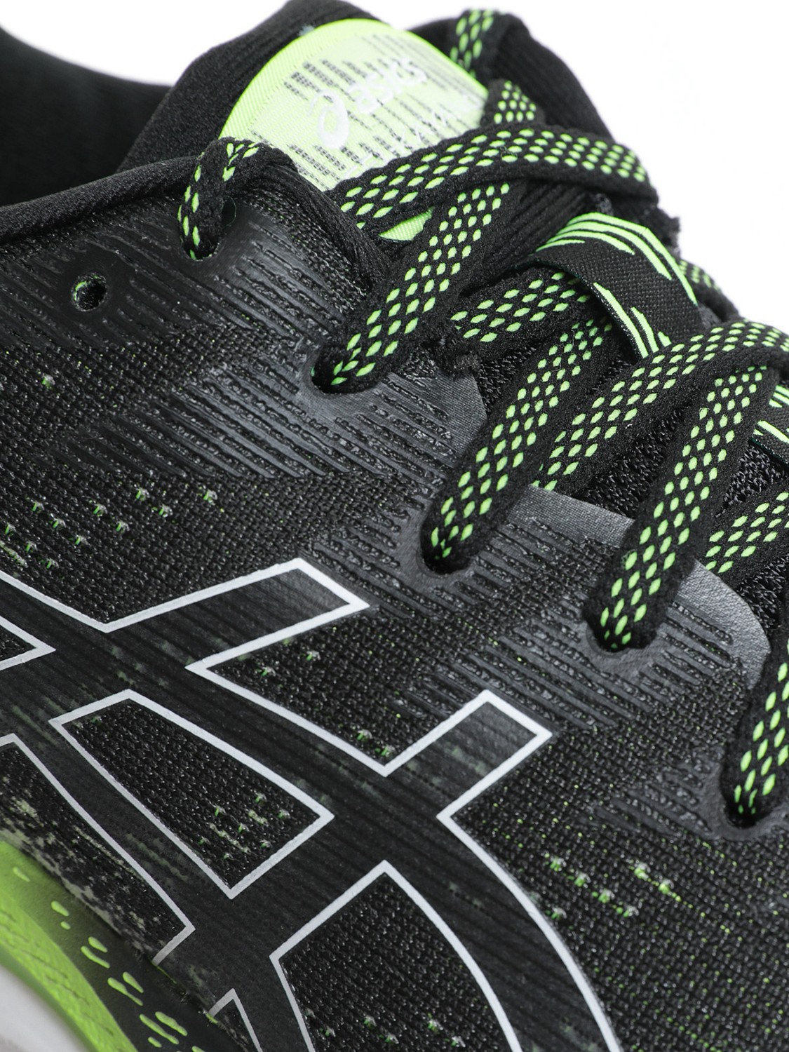 Asics black green discount